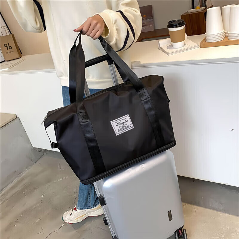 Etravel 易旅 行包 行李包 大容量外出差男女手提包健身包袋 可扩展款 黑色 31.41元