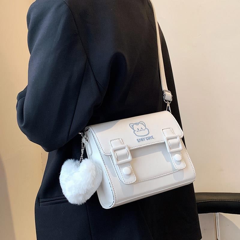 kingtrip 途尊 女生包包百搭学生小众设计小包包女2021新款潮质感单肩斜挎包可爱 白色+毛毛挂件 23元